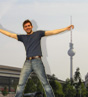 Student in front of  Kassel TV tower